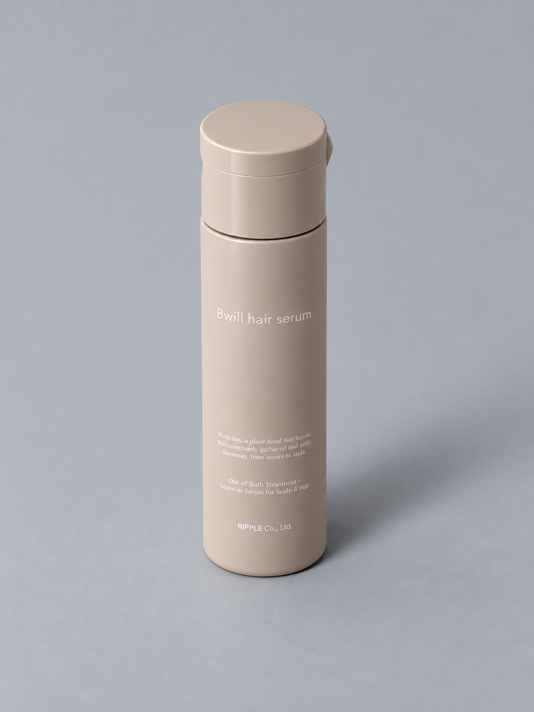 グレーの背景で、斜め上から撮影したBwill hair serum